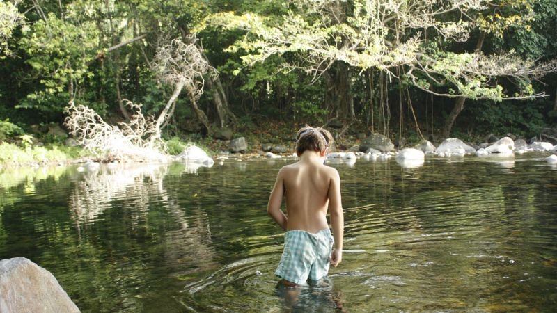 Swimming at daybreak, Rosalie River, Dominica, West&nbsp;Indies.